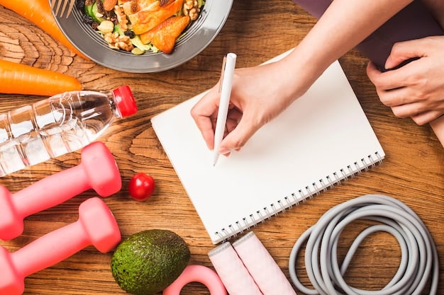 A person writing down workout goals in a notebook, with a water bottle, a fitness tracker, and healthy snacks on the table, illustrating a mindful approach to planning fitness activities.