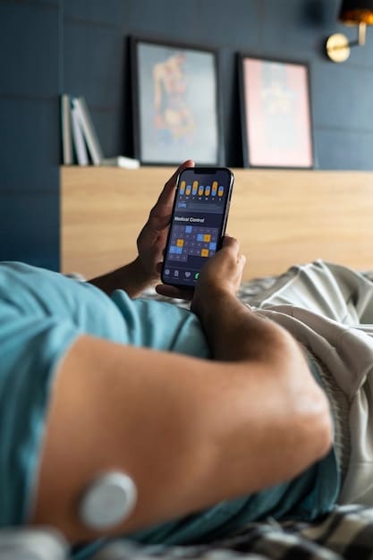 A person using a sleep tracking app on their smartphone while in bed, showcasing the data and insights provided by the app.