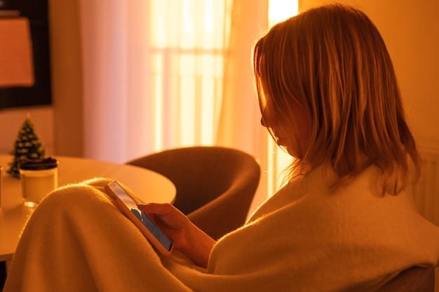 A brightly lit room with a person sitting near a light therapy box. The person appears relaxed and is engaged in a calming activity such as reading.