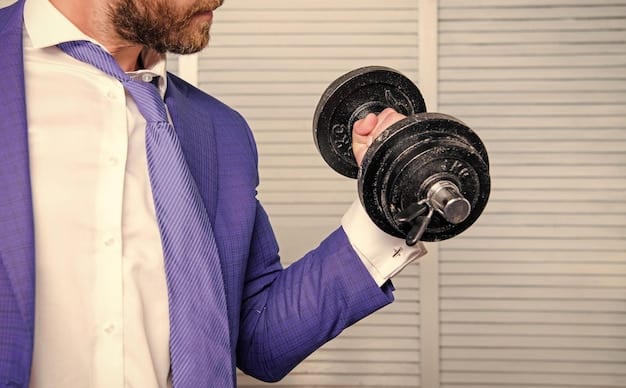 A person lifting dumbbells in a gym, focusing on their bicep muscles. They are using proper form and wearing appropriate athletic attire.