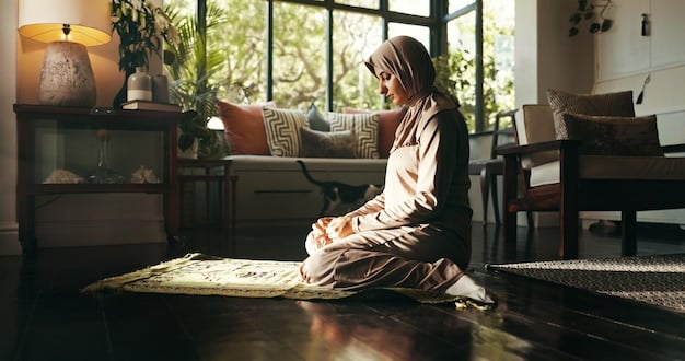 A person sitting comfortably on a cushion, meditating in a peaceful room with soft lighting. The room is decorated with plants and calming colors to enhance the sense of serenity.